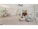 Bright living space featuring neutral tones, dining area, and comfortable seating arrangement at 3328 Chastain Gardens Nw Dr, Kennesaw, GA 30144