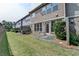 A well-maintained backyard includes a patio area, a green lawn, and tasteful landscaping for outdoor enjoyment at 5016 Garrett Ct, Alpharetta, GA 30005