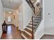 View of the hardwood entry way and open staircase at 5016 Garrett Ct, Alpharetta, GA 30005