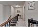 Bright hallway with decorative accents and staircase, leading to other parts of the home at 5016 Garrett Ct, Alpharetta, GA 30005