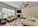 The living room has a fireplace, and hardwood floors at 5016 Garrett Ct, Alpharetta, GA 30005