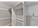 Closet featuring built-in shelving and a window at 1094 Amber Sw Rdg, Lilburn, GA 30047