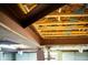 Close up on unfinished basement ceiling featuring steel I-beams and wood framing at 360 Parr Farm Rd, Covington, GA 30016