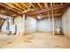 Unfinished basement has concrete walls, an exposed ceiling, utility hookups, and plumbing at 360 Parr Farm Rd, Covington, GA 30016