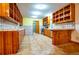 Open kitchen featuring warm wood cabinets and decorative tile backsplash at 360 Parr Farm Rd, Covington, GA 30016
