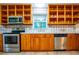 Updated kitchen with stainless steel appliances and ample storage at 360 Parr Farm Rd, Covington, GA 30016
