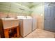 Laundry room with a sink and full-sized washer and dryer at 360 Parr Farm Rd, Covington, GA 30016