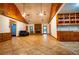 Open living room featuring high ceilings, stone fireplace, and tile flooring at 360 Parr Farm Rd, Covington, GA 30016