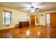 Bedroom with hardwood floors, natural light, and ensuite bath at 360 Parr Farm Rd, Covington, GA 30016