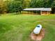 Aerial view of a covered outbuilding on a large, grassy lot at 360 Parr Farm Rd, Covington, GA 30016