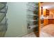 Pantry with wire shelving located adjacent to the kitchen at 360 Parr Farm Rd, Covington, GA 30016