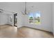 Formal dining room featuring hardwood floors, white walls, and recessed lighting at 6120 Hutchins Dr, Buford, GA 30518