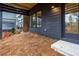 View of backyard with wood exterior and patio area at 1168 Mado Loop, Chattahoochee Hills, GA 30268