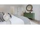 Bedroom featuring a green dresser and wood floors at 1168 Mado Loop, Chattahoochee Hills, GA 30268