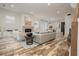 Expansive living room featuring a fireplace, wood floors, and an open floor plan perfect for entertaining at 1168 Mado Loop, Chattahoochee Hills, GA 30268