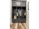 Mudroom with built-in gray storage cabinets and drawers, offering ample space for organization at 1168 Mado Loop, Chattahoochee Hills, GA 30268