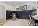 Cozy office with comfortable seating, artwork, and an accent wall, creating a productive atmosphere at 1168 Mado Loop, Chattahoochee Hills, GA 30268