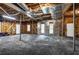 Large unfinished basement area with exposed ceiling, ductwork, and windows at 3927 Airline Rd, Mcdonough, GA 30252
