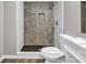 Bathroom with tiled walk-in shower, modern vanity, and updated fixtures at 3927 Airline Rd, Mcdonough, GA 30252