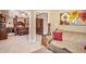 View of the living room and the primary bedroom beyond at 7052 Camp Falls Ct, Winston, GA 30187