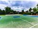 Outdoor basketball court with blue and green playing surface and surrounding greenery at 423 Livingston Pt, Acworth, GA 30102