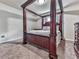 Bedroom with a four-poster bed, carpet, and neutral wall color at 423 Livingston Pt, Acworth, GA 30102