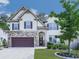 Charming two-story home with stone accents, a two-car garage, and a well-manicured front yard at 423 Livingston Pt, Acworth, GA 30102