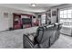 Upstairs media room with seating, TV, and lots of space at 423 Livingston Pt, Acworth, GA 30102