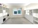 Bedroom featuring open shelving and a window with blinds at 57 Cantey Nw Pl, Atlanta, GA 30327