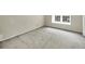 Bedroom featuring a large window and neutral-toned walls at 57 Cantey Nw Pl, Atlanta, GA 30327