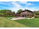 Attractive community clubhouse with a manicured lawn and lush, professional landscaping at 57 Cantey Nw Pl, Atlanta, GA 30327
