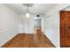 Open dining area with hardwood floors and access to backyard at 57 Cantey Nw Pl, Atlanta, GA 30327