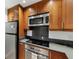 Updated kitchen features stainless appliances, modern cabinets, and functional countertops at 57 Cantey Nw Pl, Atlanta, GA 30327