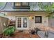 Private brick patio features beautiful garden and access from French doors at 57 Cantey Nw Pl, Atlanta, GA 30327