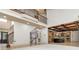 Open-concept living space with a kitchen, living room and staircase to the second floor at 2688 Hidden Falls Ne Dr, Buford, GA 30519