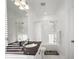 Bright bathroom featuring a large mirror, vanity with dark countertop, and shower-tub combination at 3208 Sonnet Se Walk, Atlanta, GA 30339