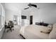 Bright bedroom with many windows, a desk area and TV at 3208 Sonnet Se Walk, Atlanta, GA 30339