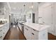 Bright, modern kitchen with a large island, stainless steel appliances, and open layout at 3208 Sonnet Se Walk, Atlanta, GA 30339