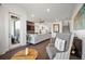 Open concept living room with modern furnishings and great natural light throughout at 3208 Sonnet Se Walk, Atlanta, GA 30339