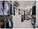 Large walk-in closet with custom shelves, hanging rods, drawers, and ample storage space at 3208 Sonnet Se Walk, Atlanta, GA 30339