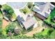 Aerial view of the home showing the roof, yard, landscaping, and neighborhood at 3954 Rhyne Se Way, Smyrna, GA 30082