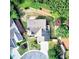 Aerial view of a home showcasing its roof, landscaping, driveway, and surrounding neighborhood at 3954 Rhyne Se Way, Smyrna, GA 30082