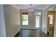 Dining area showcasing natural light, modern chandelier and easy access to outdoor space at 3954 Rhyne Se Way, Smyrna, GA 30082