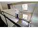 Bright foyer with high ceilings, hardwood floors, and a view of the living room at 3954 Rhyne Se Way, Smyrna, GA 30082