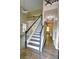 Grand foyer with a staircase, chandelier, high ceilings and dark hardwood flooring at 3954 Rhyne Se Way, Smyrna, GA 30082
