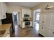 Open kitchen layout features stainless steel appliances, granite counters and ample cabinet space at 3954 Rhyne Se Way, Smyrna, GA 30082