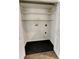 Spacious walk-in pantry with wooden shelves and dark flooring, perfect for organized storage at 3954 Rhyne Se Way, Smyrna, GA 30082