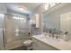 Bathroom featuring a toilet, vanity with a sink, and a glass enclosed shower at 5223 Willow Ridge Dr, Woodstock, GA 30188