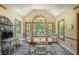 Bright dining area with large windows and a view of the outdoors at 5223 Willow Ridge Dr, Woodstock, GA 30188