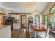 Bright dining area with wood floors and backyard views at 5223 Willow Ridge Dr, Woodstock, GA 30188